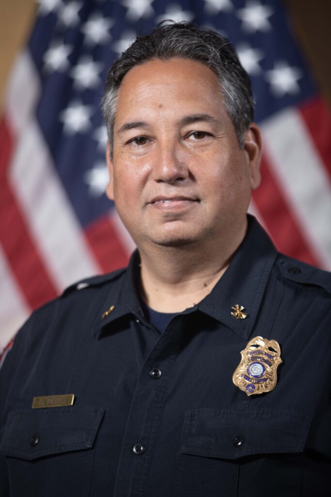 Police officer portrait with American flag