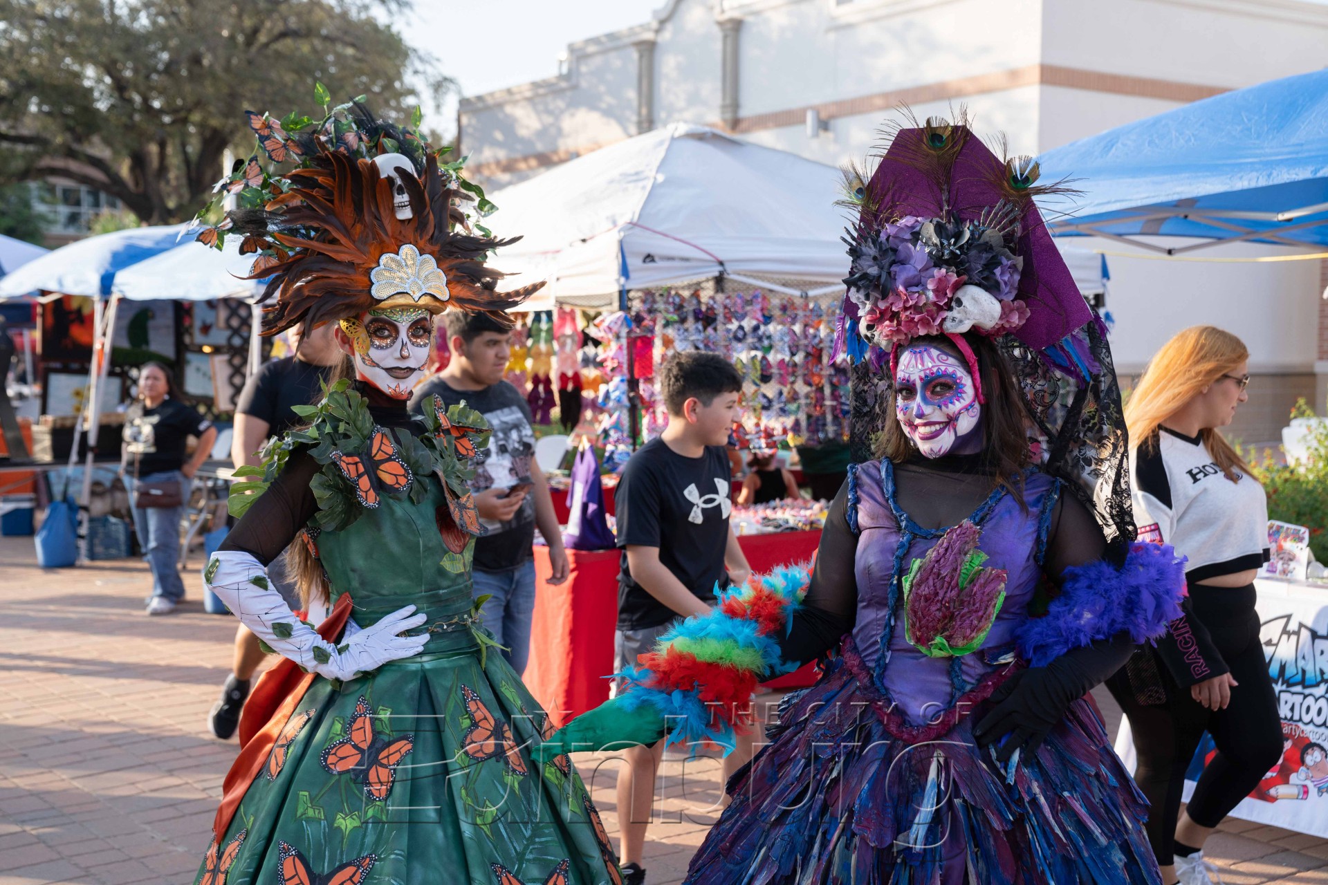 Colorful Day of the Dead costumes at market