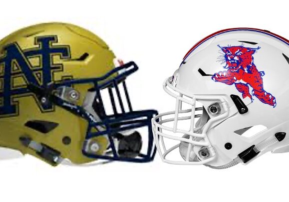 Gold and white football helmets facing each other