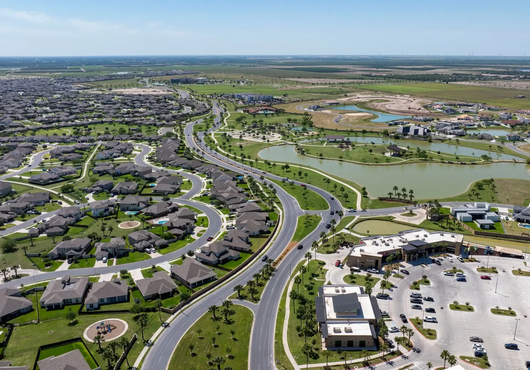 Aerial view of suburban neighborhood with ponds