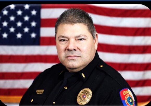 Police officer portrait with American flag