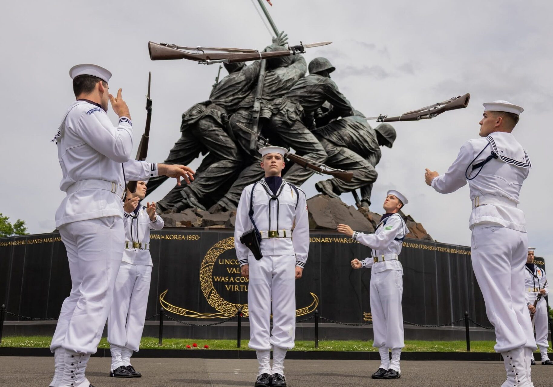 Sailors performing drill at Iwo Jima memorial
