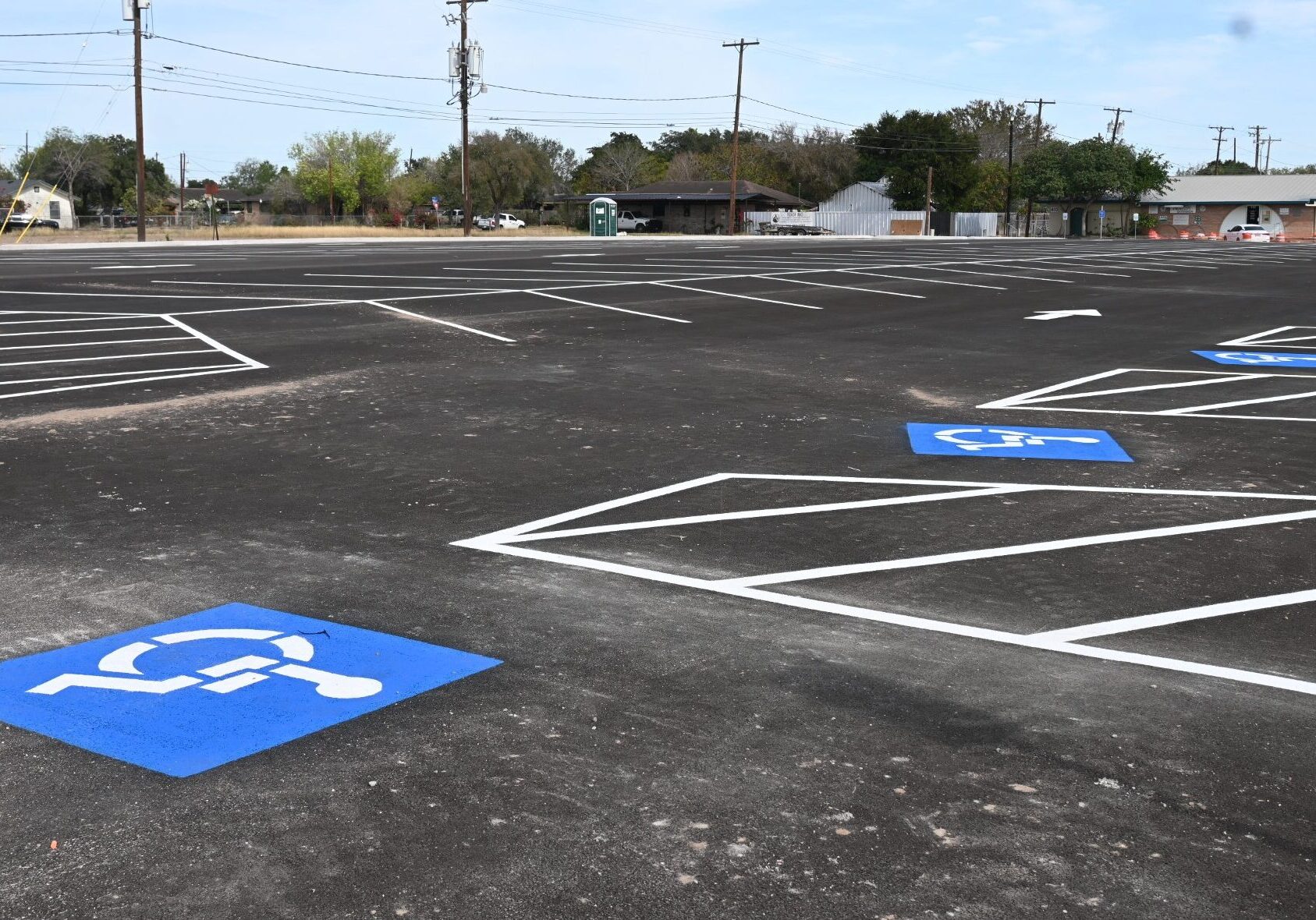 Empty parking lot with accessible parking spaces