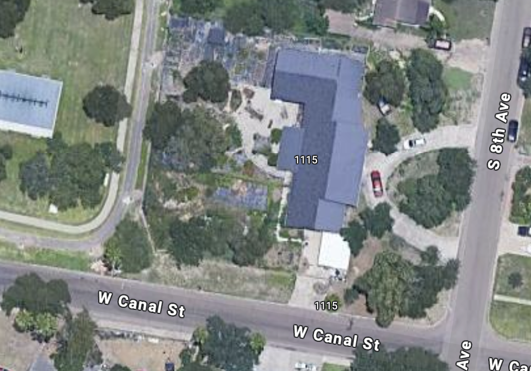 Aerial view of residential house at intersection