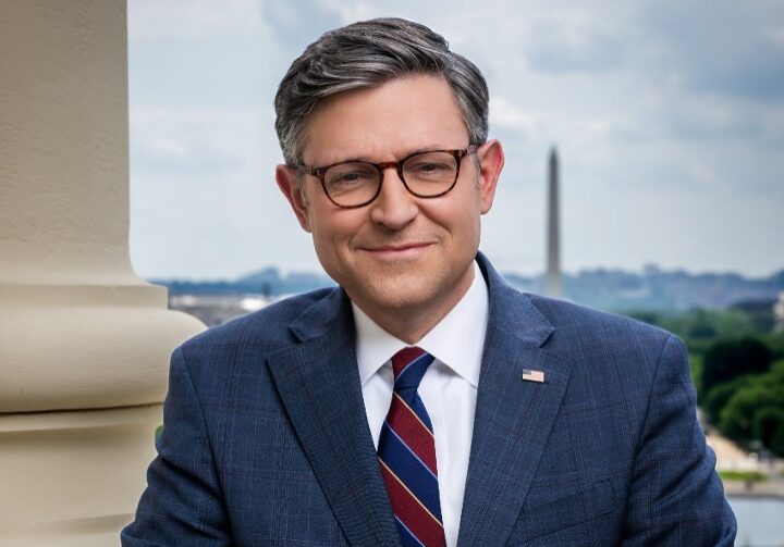 Professional man in suit with Washington Monument