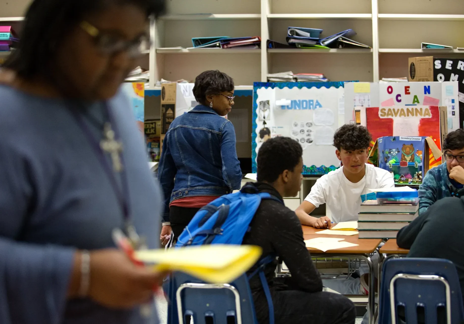 Group of students working at classroom table